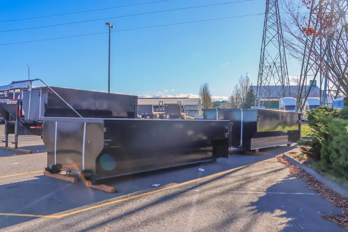 Roll-off dumpster ready for waste disposal at job site for 15 Yard Dumpster Rental in Howell